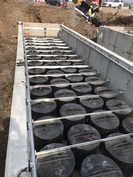 BayFilter vault with hold downs